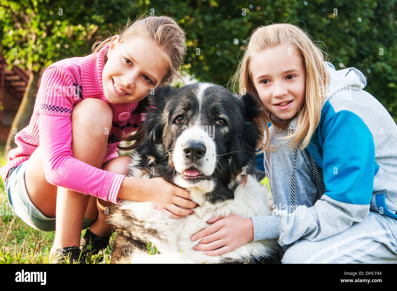 beautiful girls and his dog Stock Photo