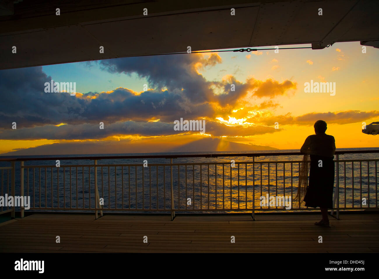 Setting sun from the decks of a cruise ship Stock Photo - Alamy