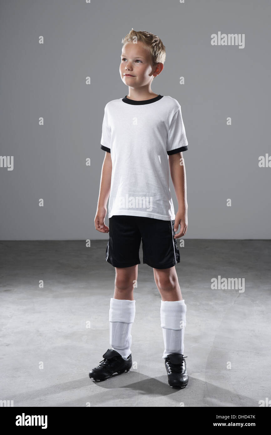 Boy in soccer jersey Stock Photo - Alamy