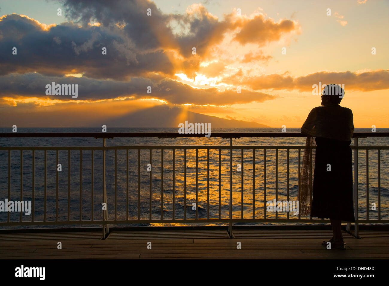 Setting sun from the decks of a cruise ship Stock Photo - Alamy