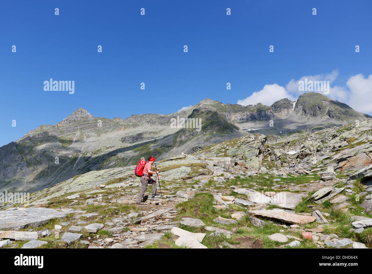 Austria, Carinthia, Obervellach, Upper Tauern, Reisseckgruppe, female hiker in front of Kammwand, Grubelwand and Riedbock Stock Photo