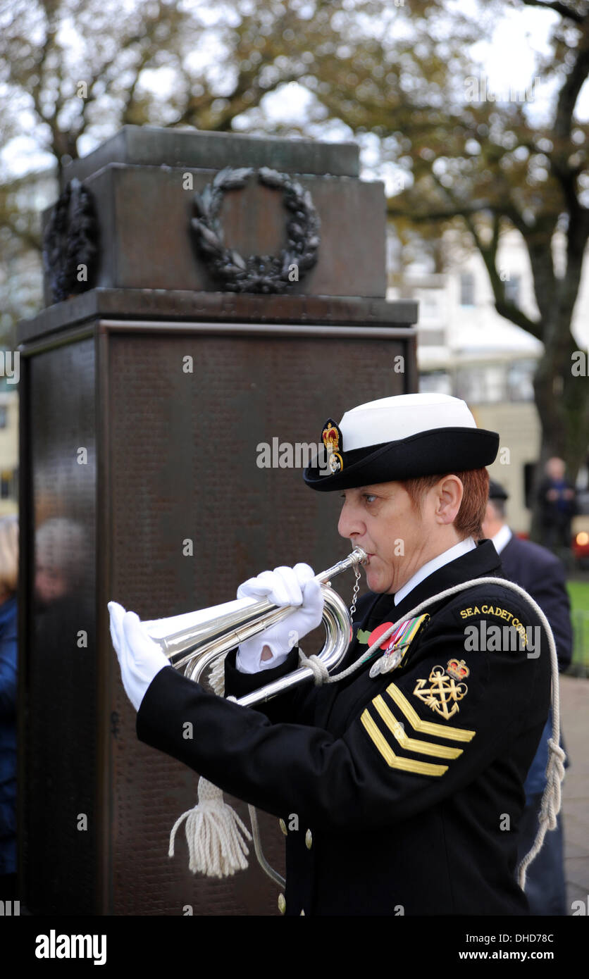 Brighton, Sussex, UK. 7th November 2013.  - The last post is played by a female bugler  at the Blessing in the Garden of Remembrance by Brighton war memorial today ready for the national Day of Remembrance this coming Sunday Stock Photo