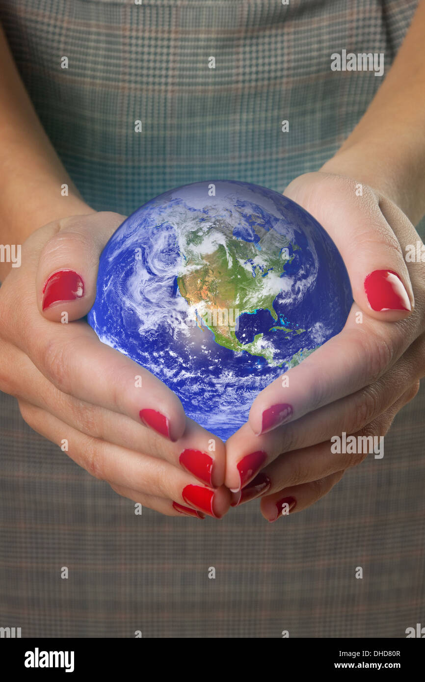 Black white hands holding globe hi-res stock photography and images - Alamy