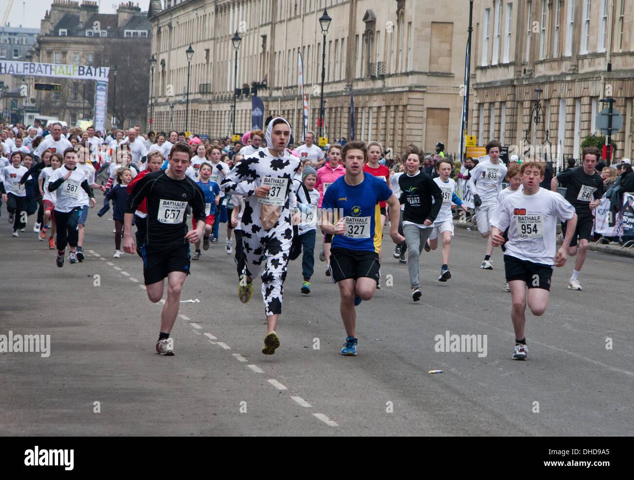 Competitors running in the annual Bath half marathon event family fun run: 3 March 2013 Stock Photo