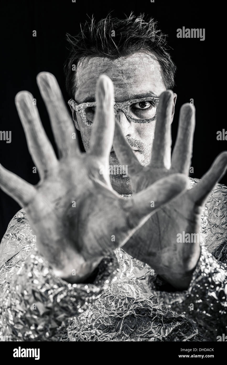 Portrait of mysterious man showing his hands. Stock Photo