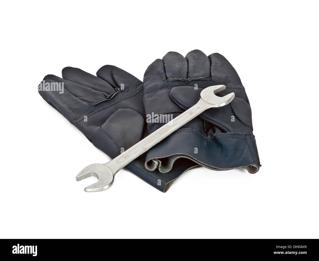 work leather gloves and wrench Stock Photo