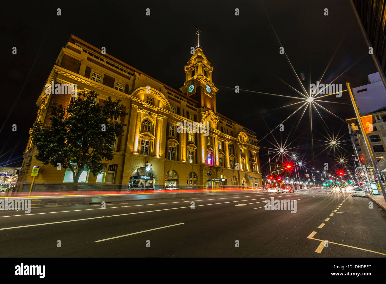 Night view of the Britomart Transport Centre in the city of Auckland from Auckland Harbour, North Island, New Zealand, Pacific Stock Photo