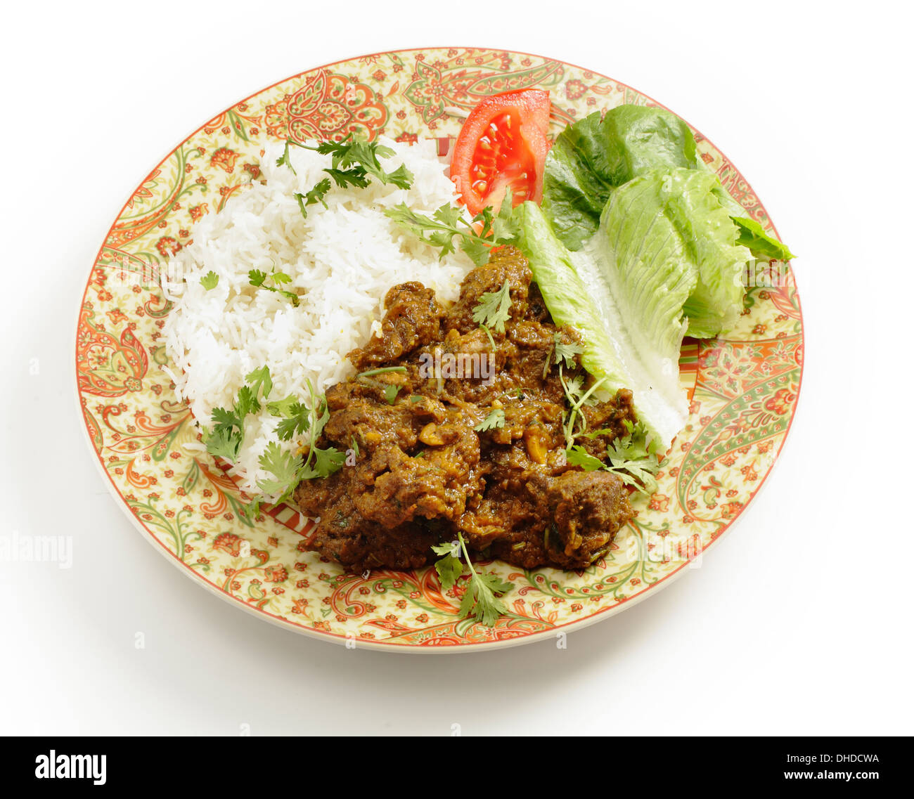 Lamb or 'ghosht' dry fried curry in the Pakistani or north Indian style, served with basmati rice Stock Photo
