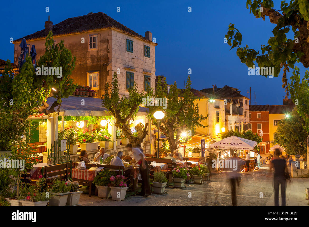 Restaurants at dusk, Makarska, Dalmatian Coast, Croatia, Europe Stock