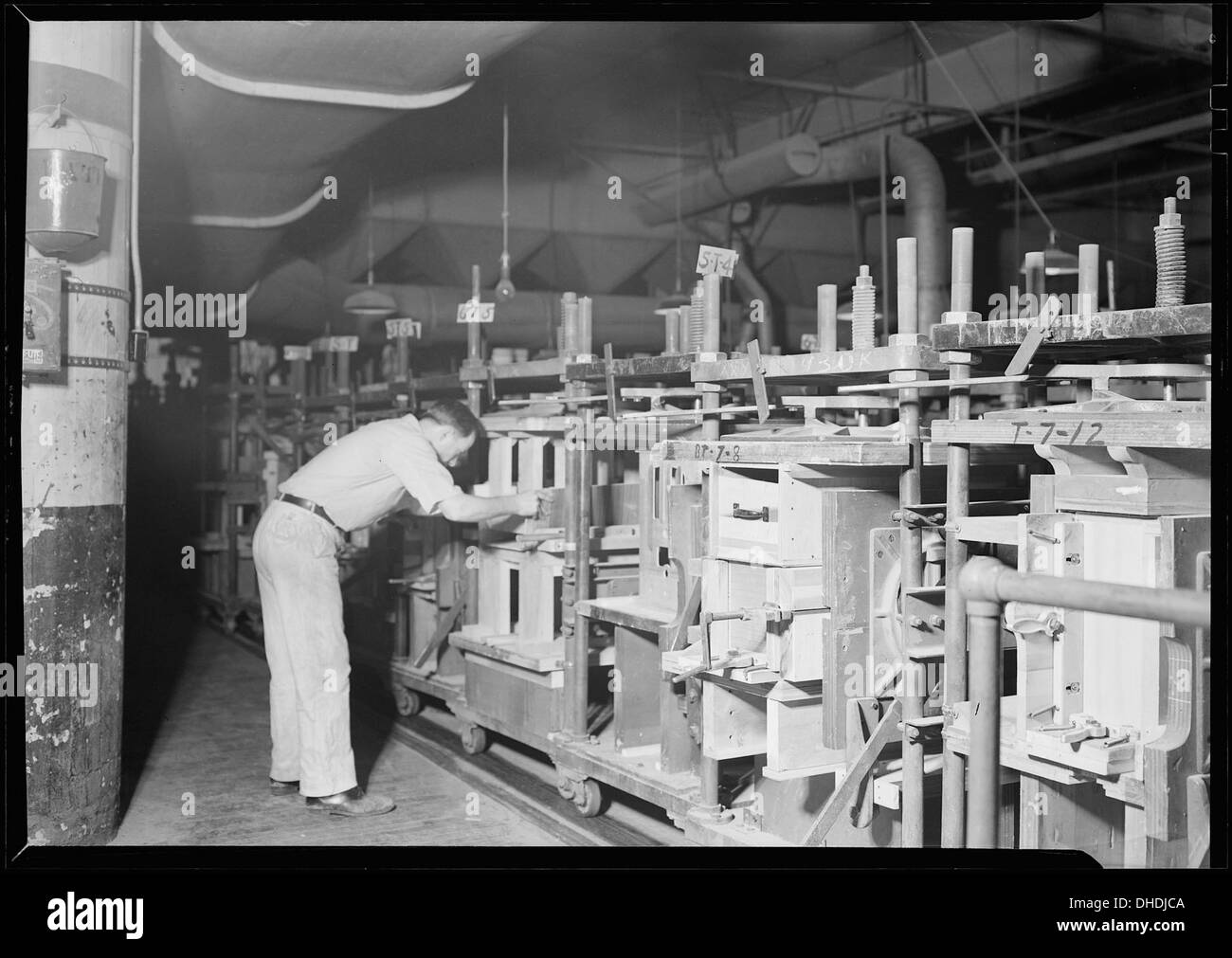 Camden, New Jersey - Cabinet making. RCA Victor. Cabinet assembler - assembling waist (front and ends of cabinet).... 518695 Stock Photo