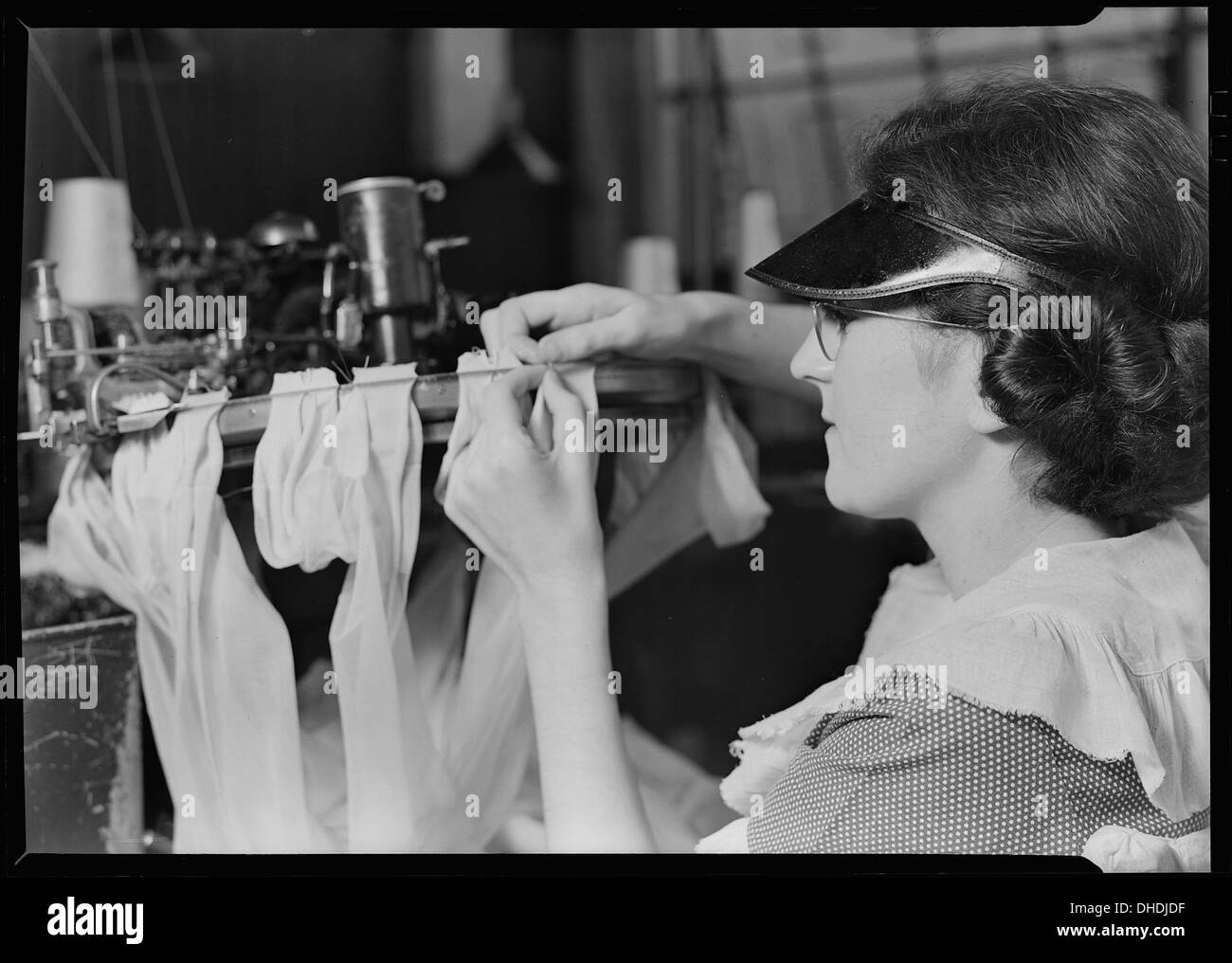 Pennsylvania hosiery minnesac mills closeup of woman draping stockings