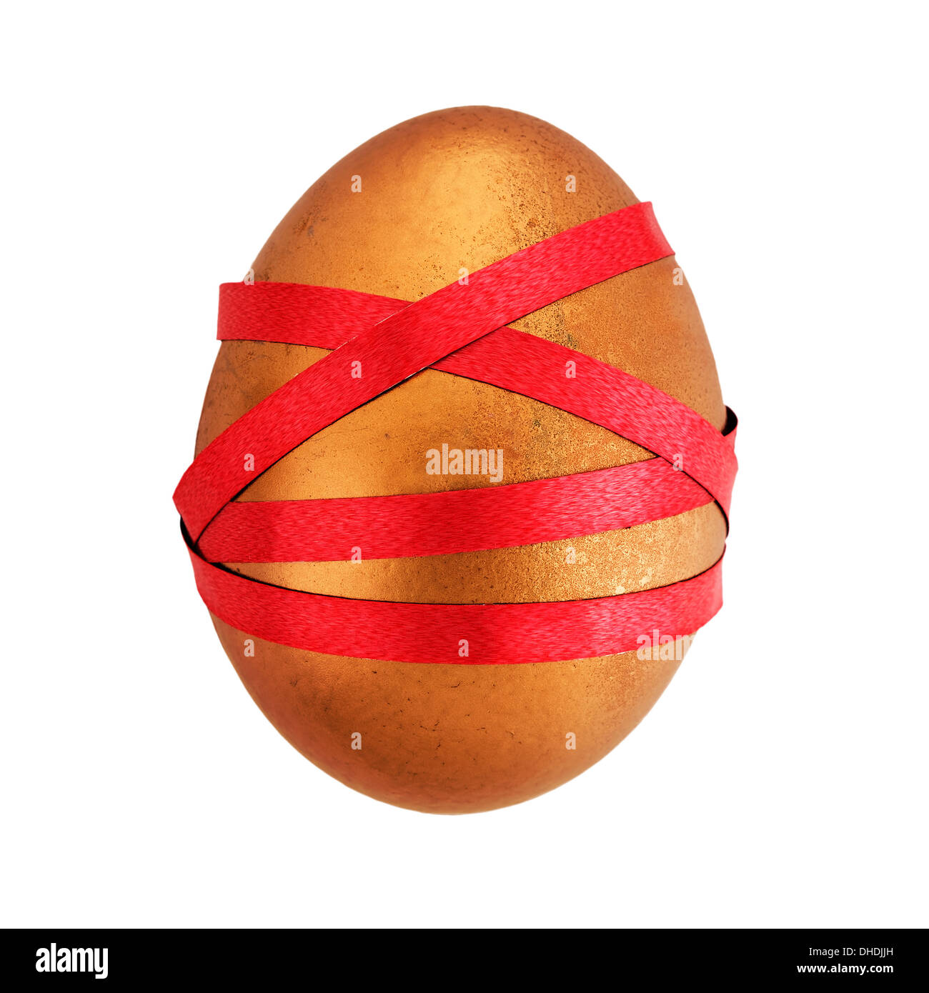 Real egg tied up in red tape - financial complexity, bureaucracy metaphor. Stock Photo
