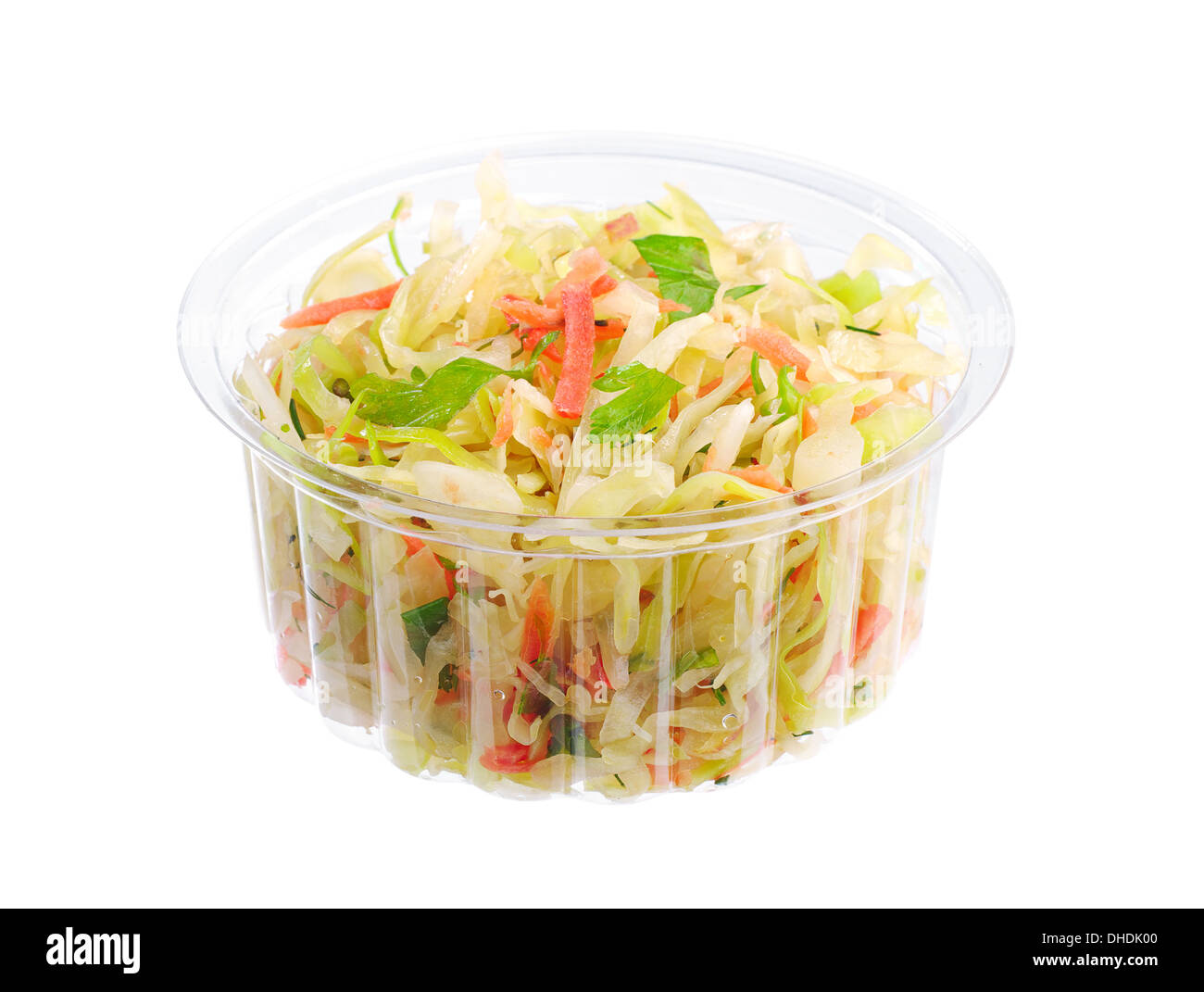 Coleslaw with carrot, onion and apple in a plastic packaging isolated on white Stock Photo