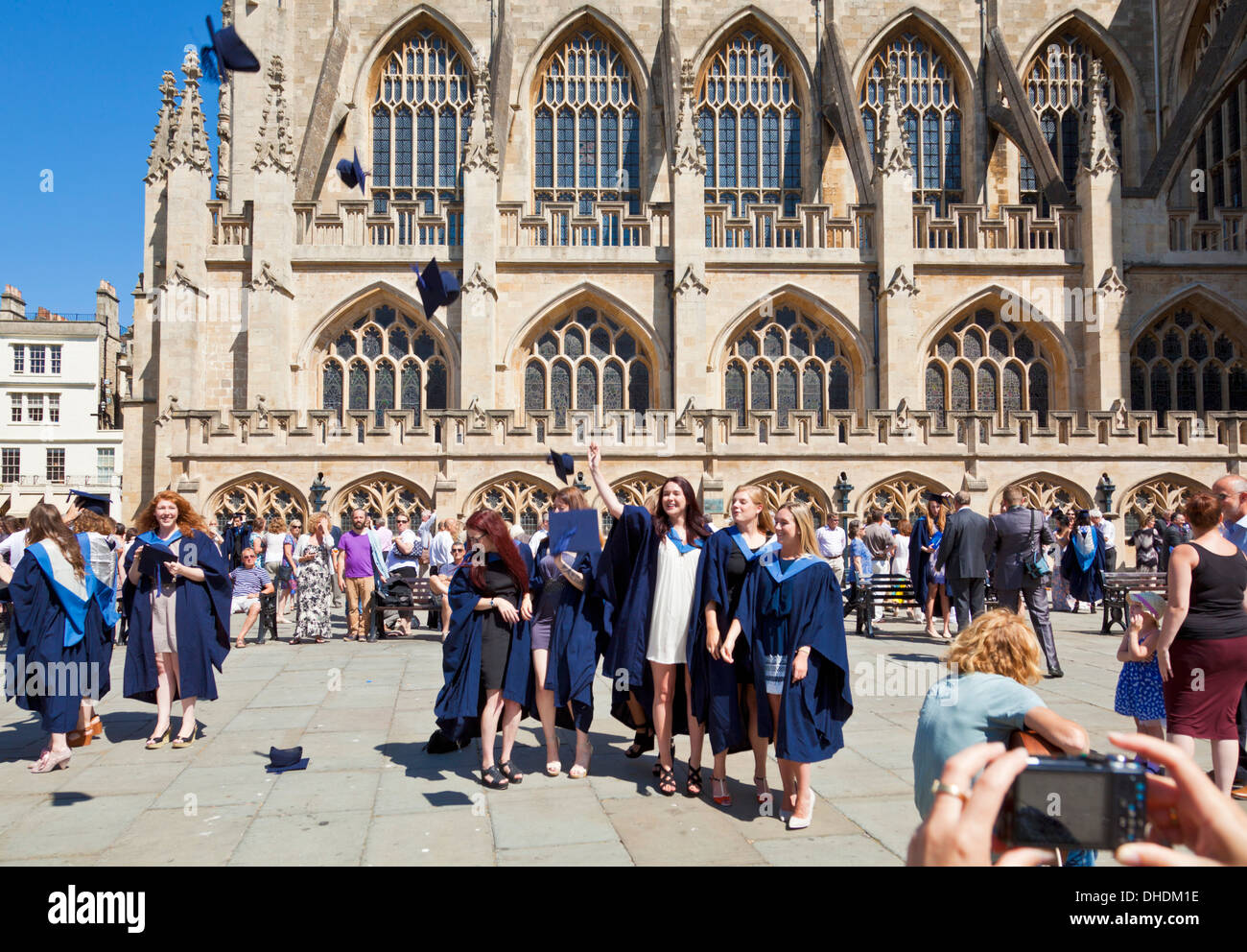 person taking a photograph of the graduating students at bath university graduation day  Bath Somerset England UK GB EU Europe Stock Photo