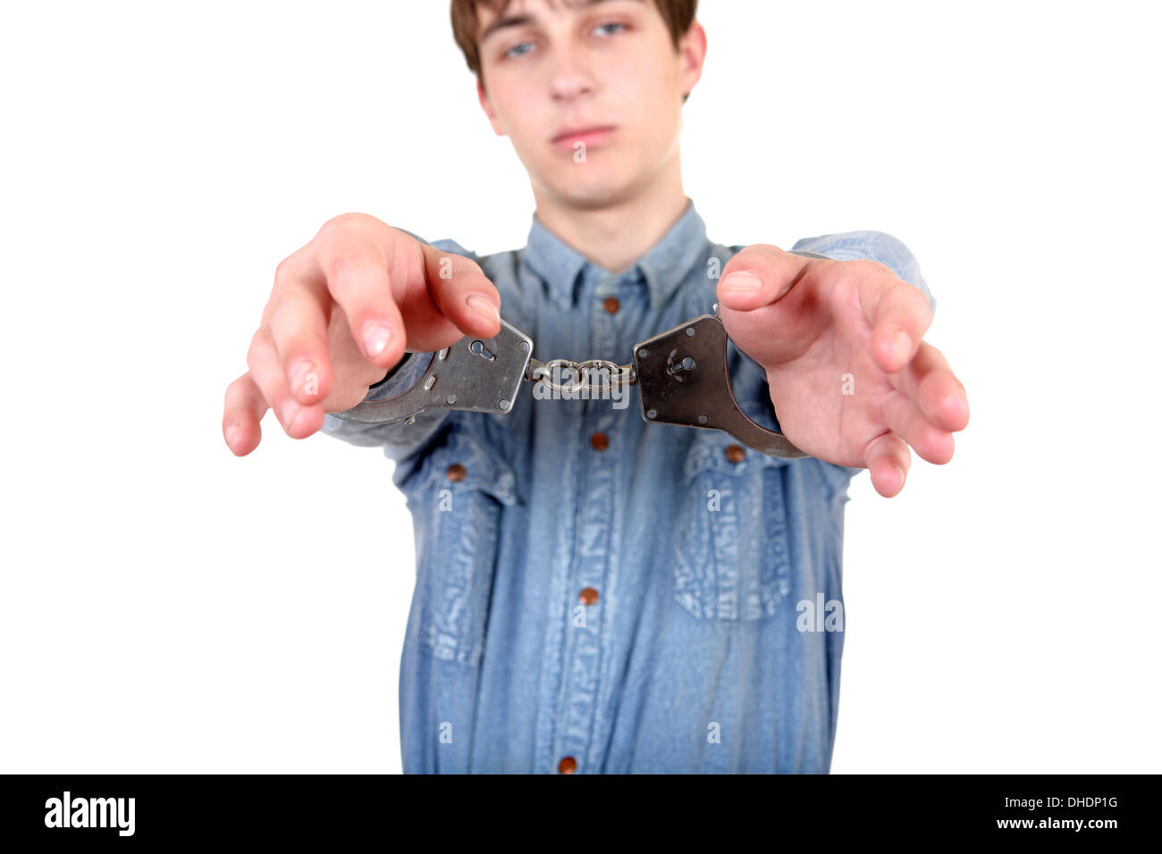 Young Man in Handcuffs Stock Photo - Alamy