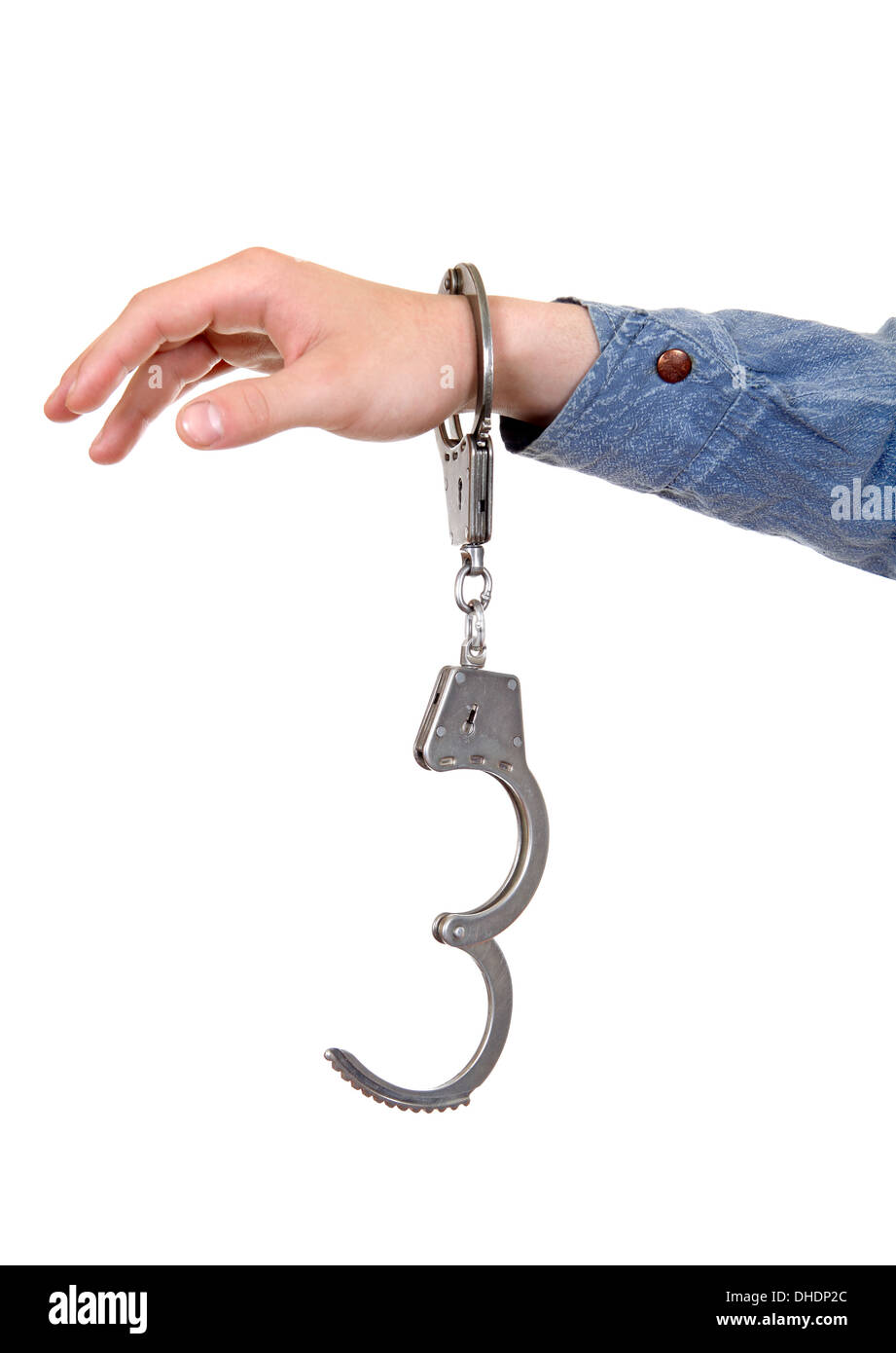 Unlocked Handcuffs on a Hand Stock Photo