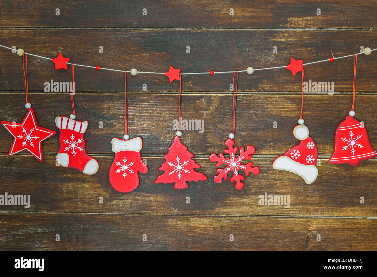 Rustic shabby chic Christmas decorations hanging on brown wooden ...