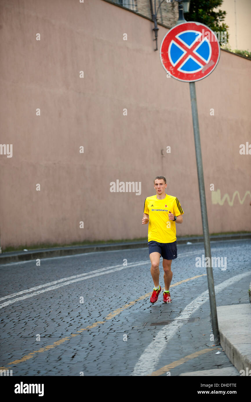 Athlete do warm up before race in Vatican city Stock Photo