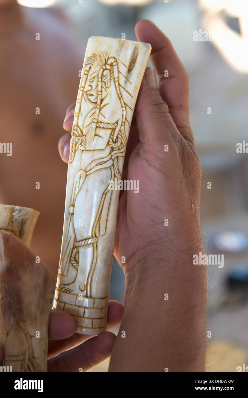 A Hand Holds Carved Handiwork; Copan, Honduras Stock Photo