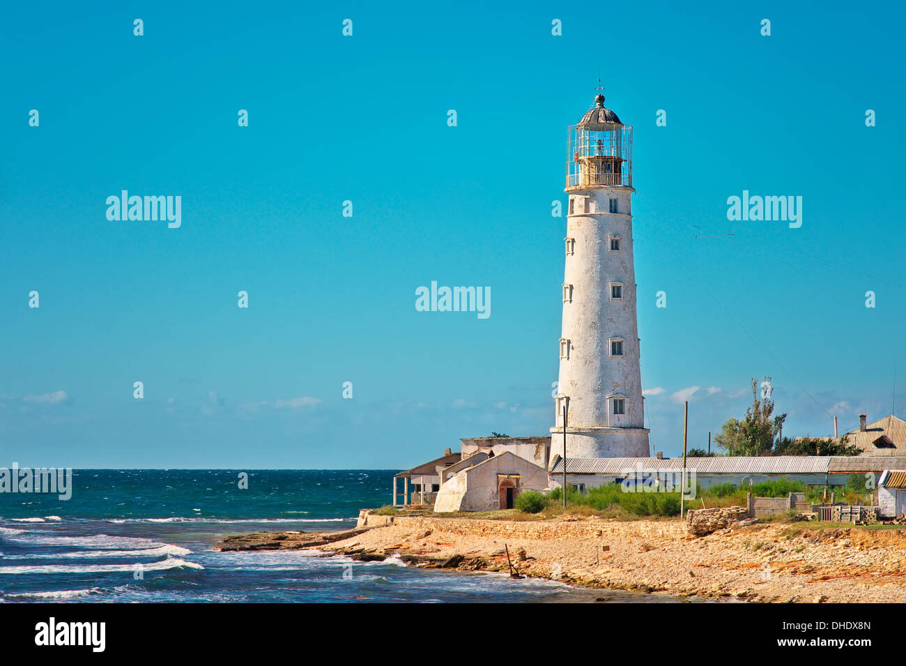 Lighthouse Building on seaside with Blue Sky on Background Landmark of Tarhankut, Crimea, Ukraine Stock Photo