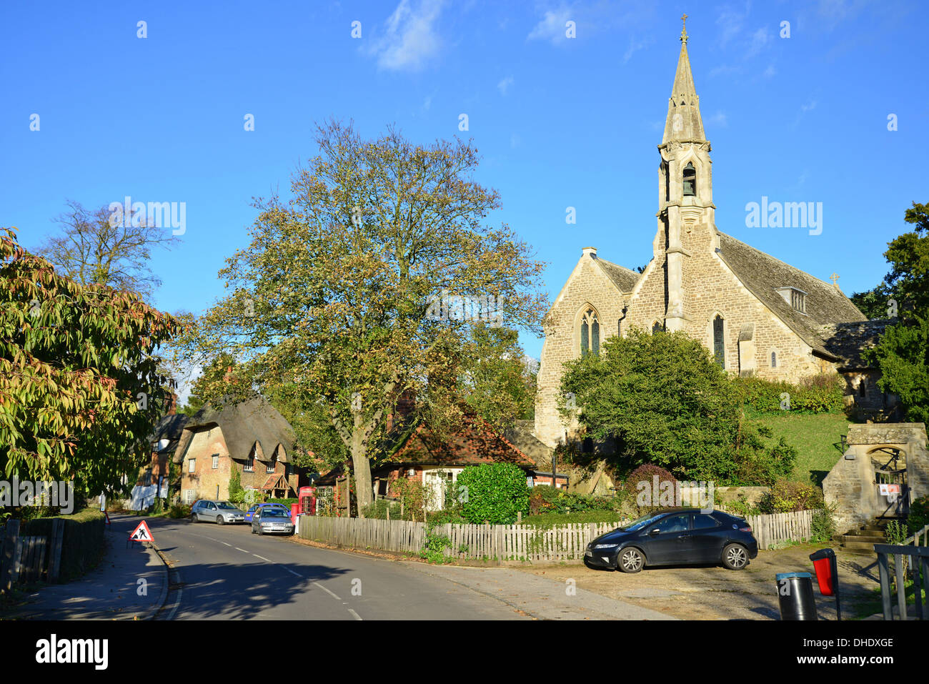 View of village showing Parish church of St. Michael & All Angels, Clifton Hampden, Oxfordshire, England, United Kingdom Stock Photo