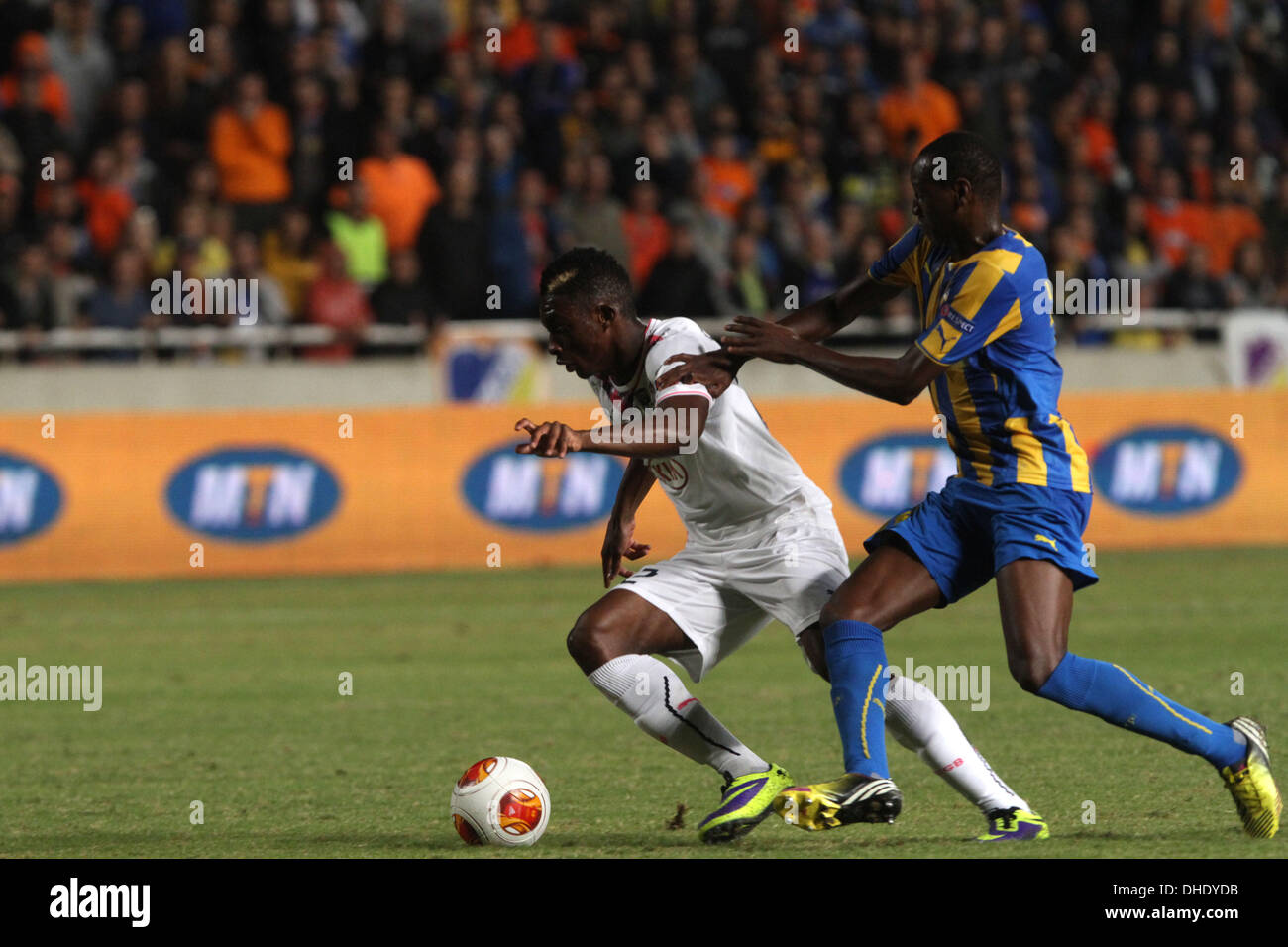 Apoel FC player Vinicious and Bordeaux  player Hadi Sacko  fight for the ball during their Europa League  soccer match at GSP stadium in Nicosia, Cyprus, Thursday, Nov. 07, 2013 Stock Photo