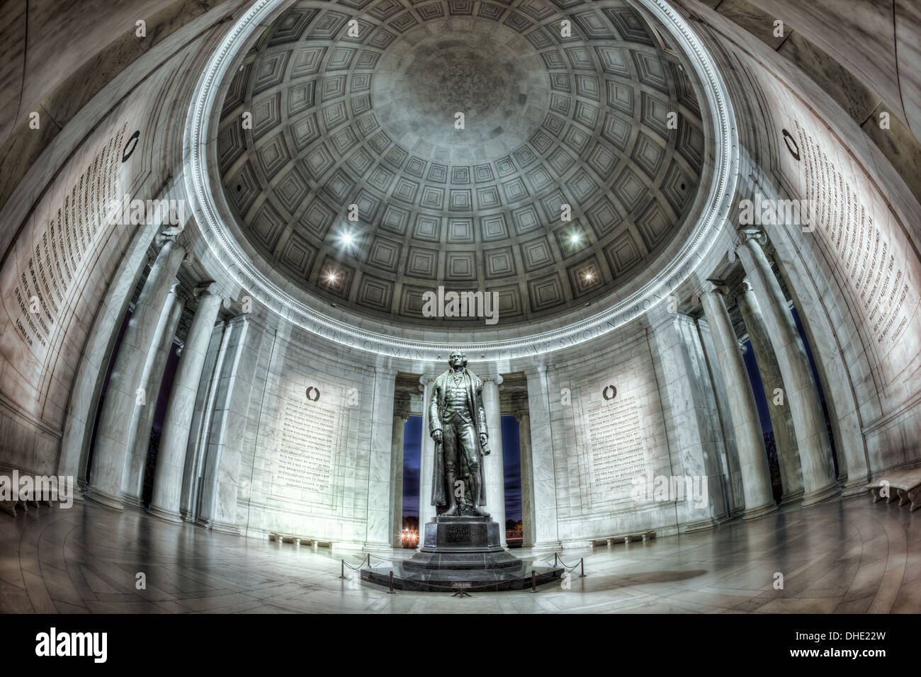 The statue of Thomas Jefferson stands tall in the domed interior of the neoclassical Thomas Jefferson Memorial in Washington, DC Stock Photo