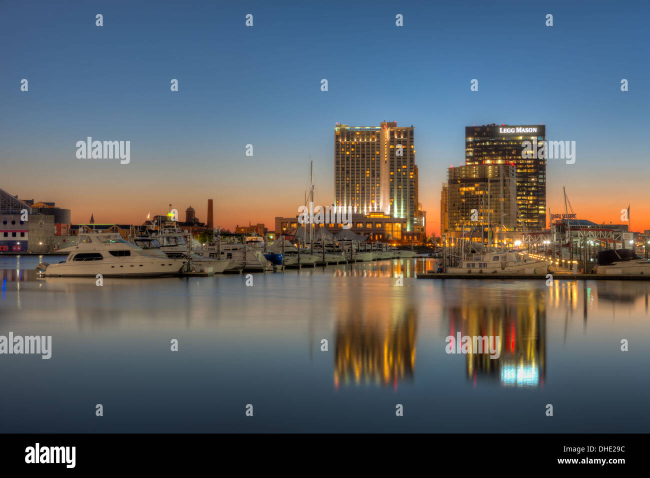 The Baltimore Harbor East development including the Baltimore Marriott Waterfront Hotel and the Legg Mason Building at dawn. Stock Photo