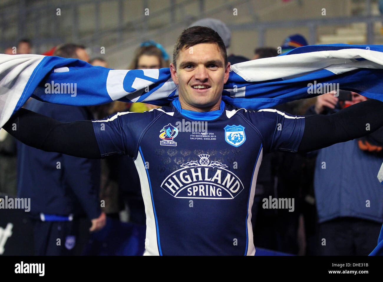 Salford, UK. 07th Nov, 2013. Danny Brough (Scotland Huddersfield Giants) celebrates the Scotland win with the Scottish flag after the Rugby League World Cup game between Scotland and USA from AJ Bell Stadium in Salford. Credit:  Action Plus Sports/Alamy Live News Stock Photo