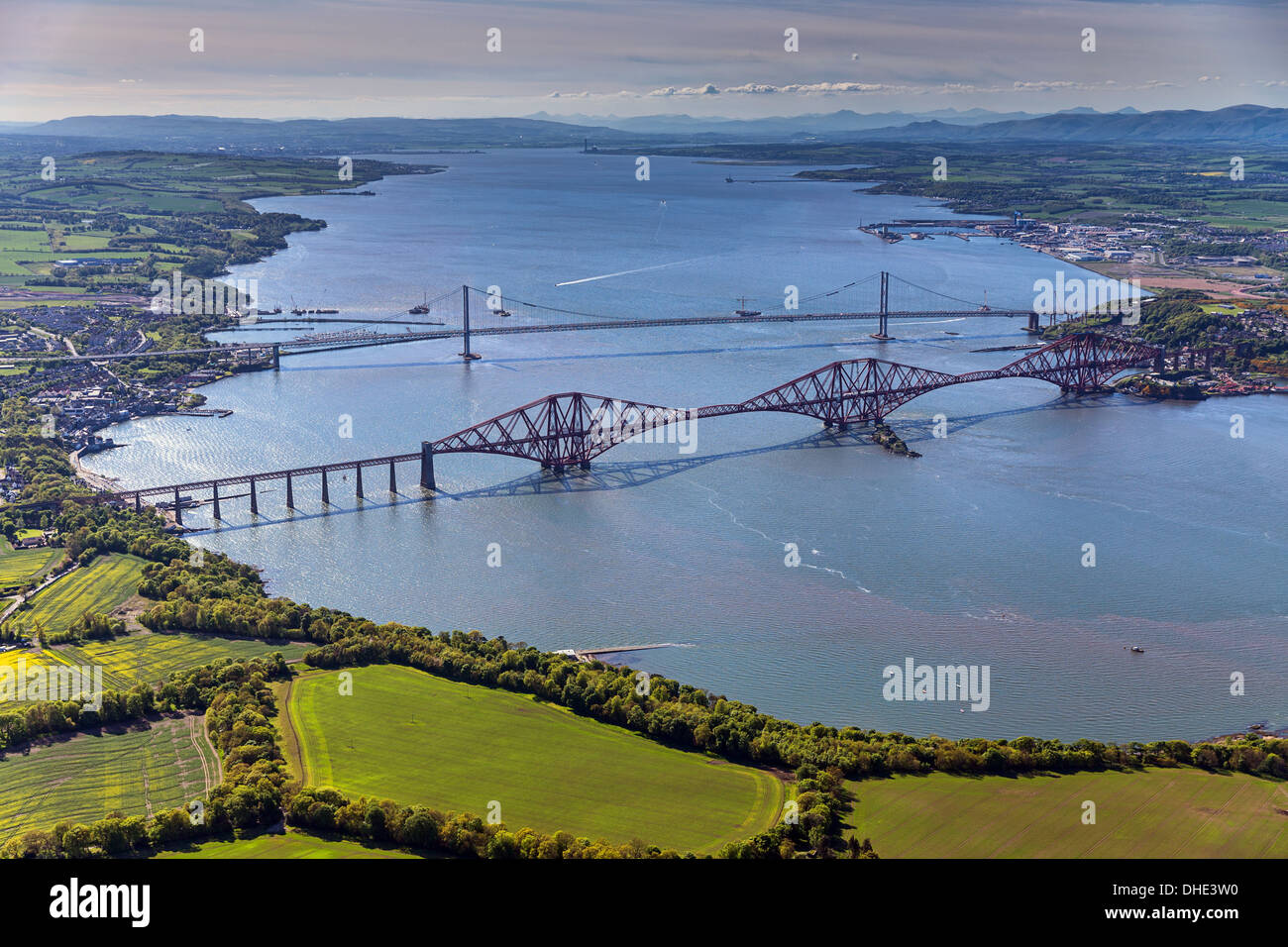Aerial view of the Forth Rail and Road Bridges as well as work on the new Queensferry Crossing, Edinburgh, Scotland Stock Photo