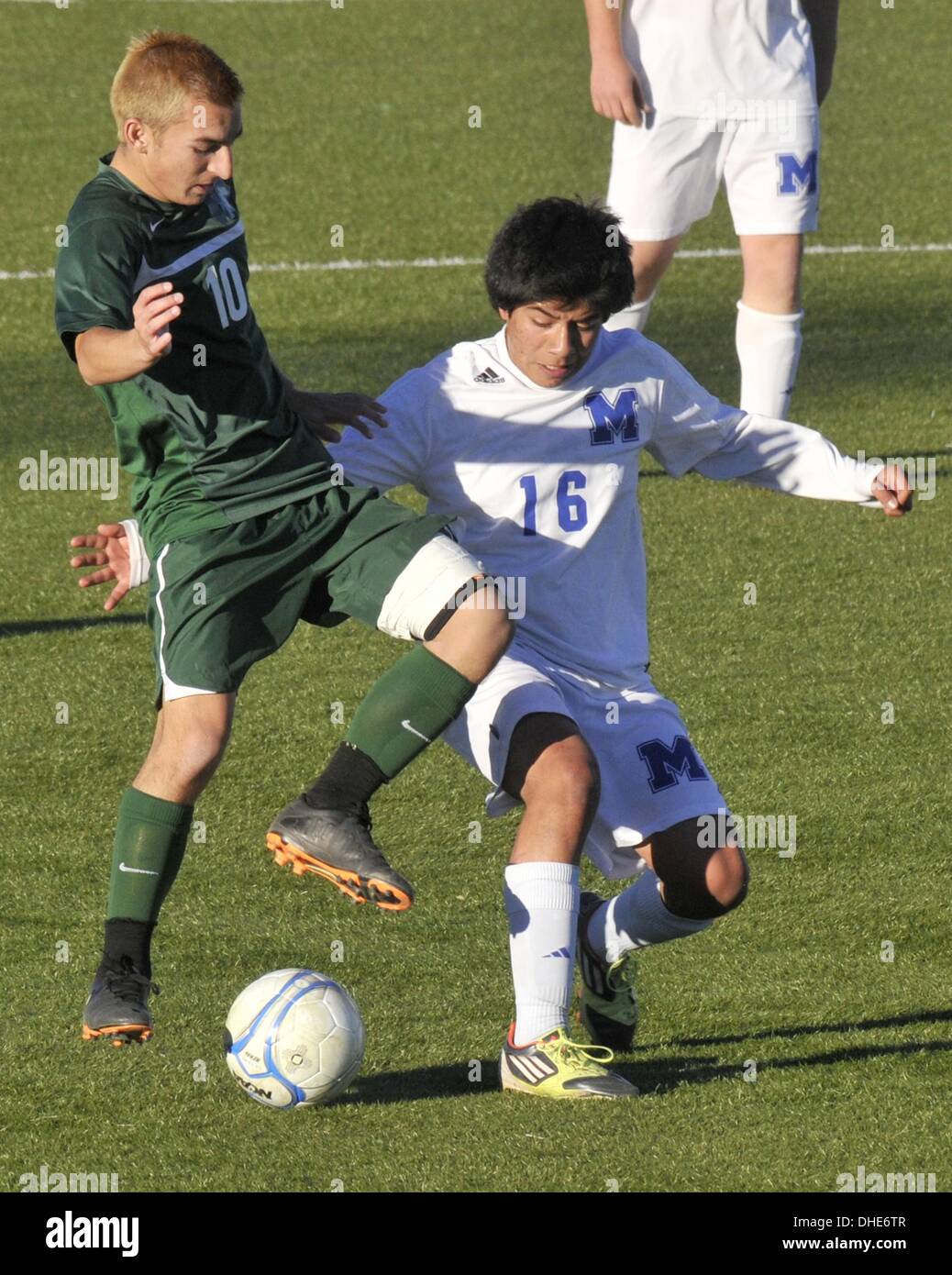 Nov. 7, 2013 - U.S. - SPORTS --Hope's Devin Edwards, left, and St. Mike's Julian Toralballa battle during the Boys State Soccer Tournament game at the APS Soccer Complex on Thursday, November 7 2013. (Credit Image: © Greg Sorber/Albuquerque Journal/ZUMAPRESS.com) Stock Photo