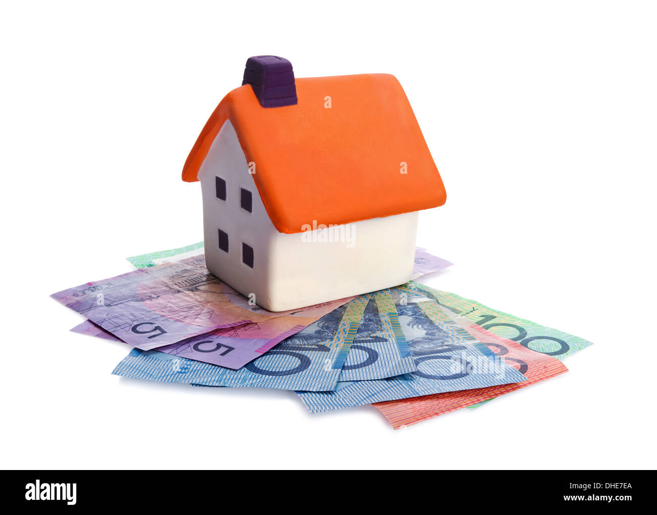 Real estate concept - house and money on white background Stock Photo