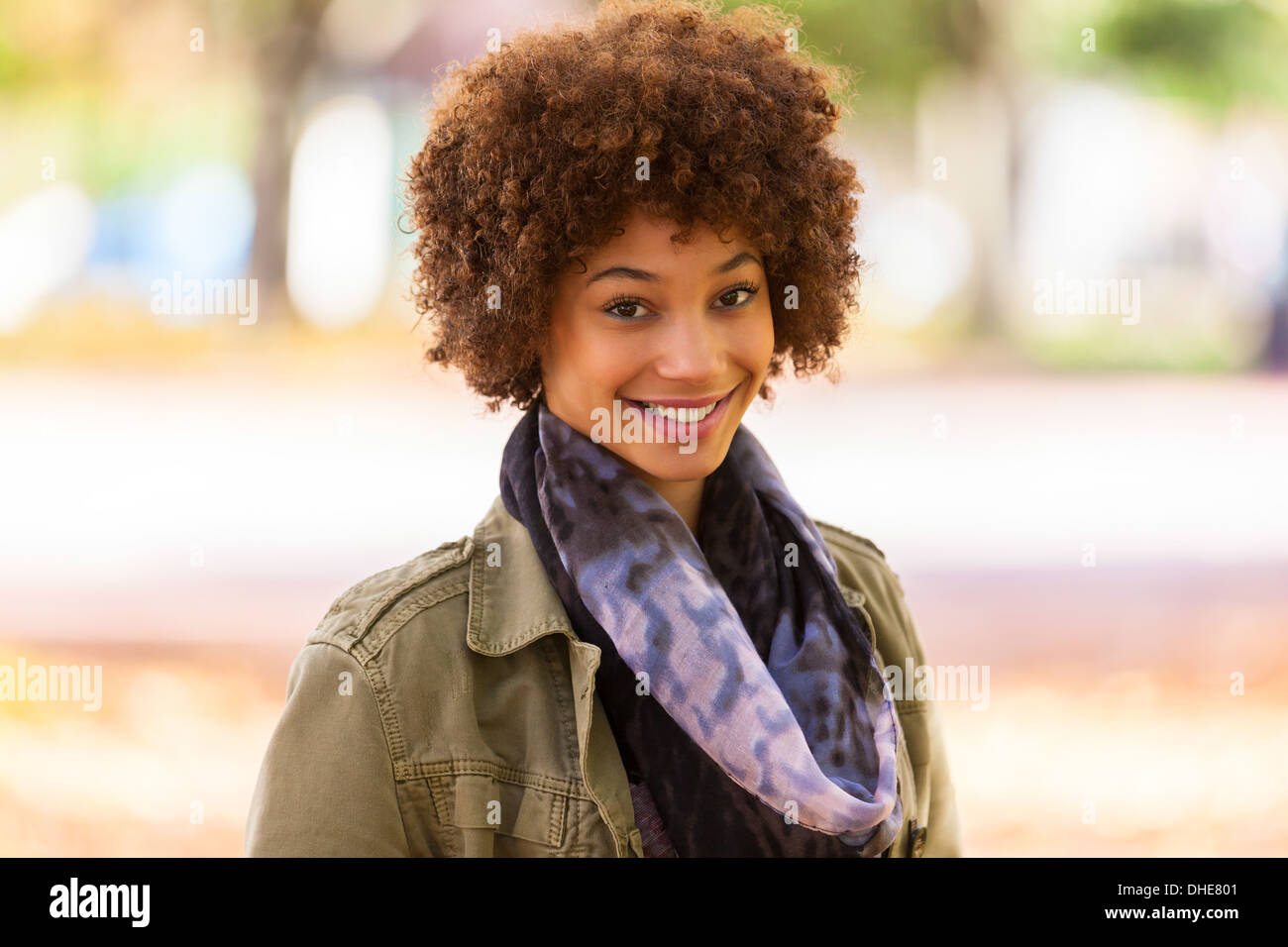 Autumn outdoor portrait of beautiful African American young woman ...