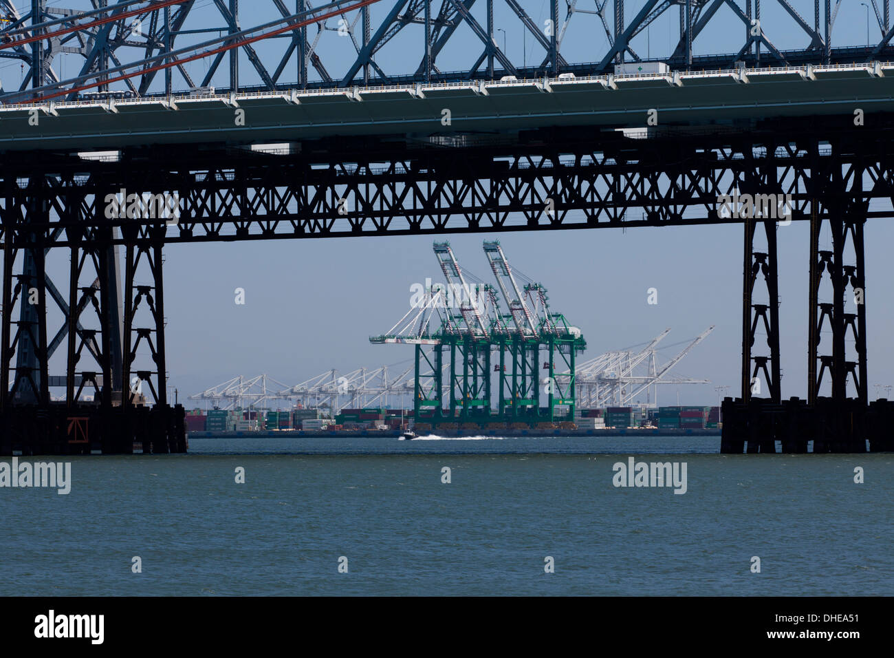 Gantry cranes under Bay Bridge San Francisco, California USA Stock