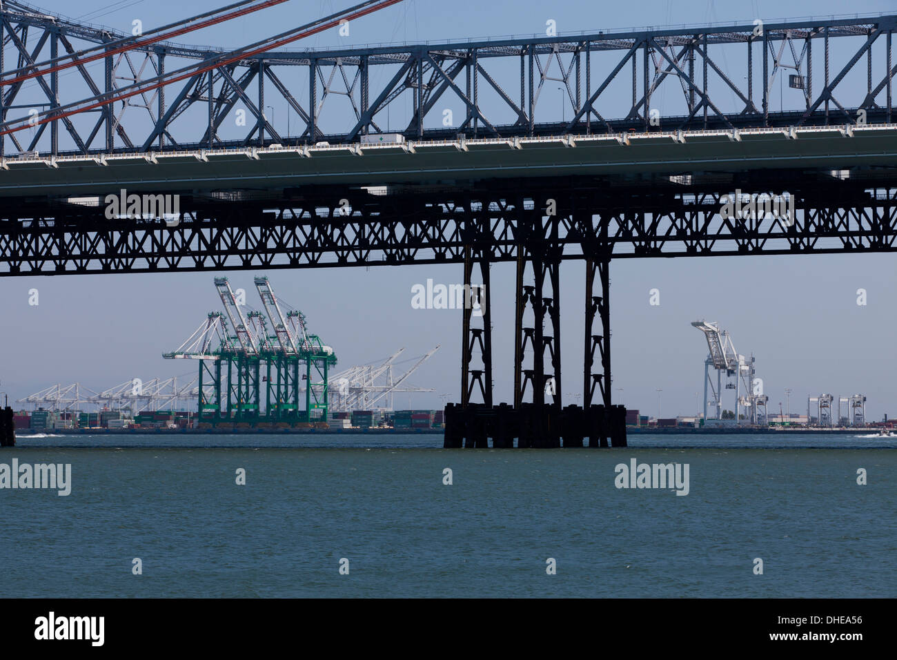 Gantry cranes under Bay Bridge - San Francisco, California USA Stock Photo