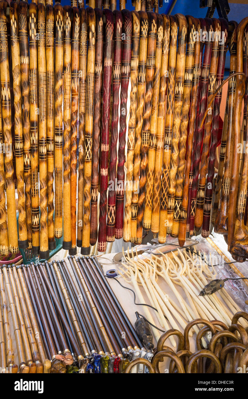 Many walking canes displayed on a street market stall Stock Photo