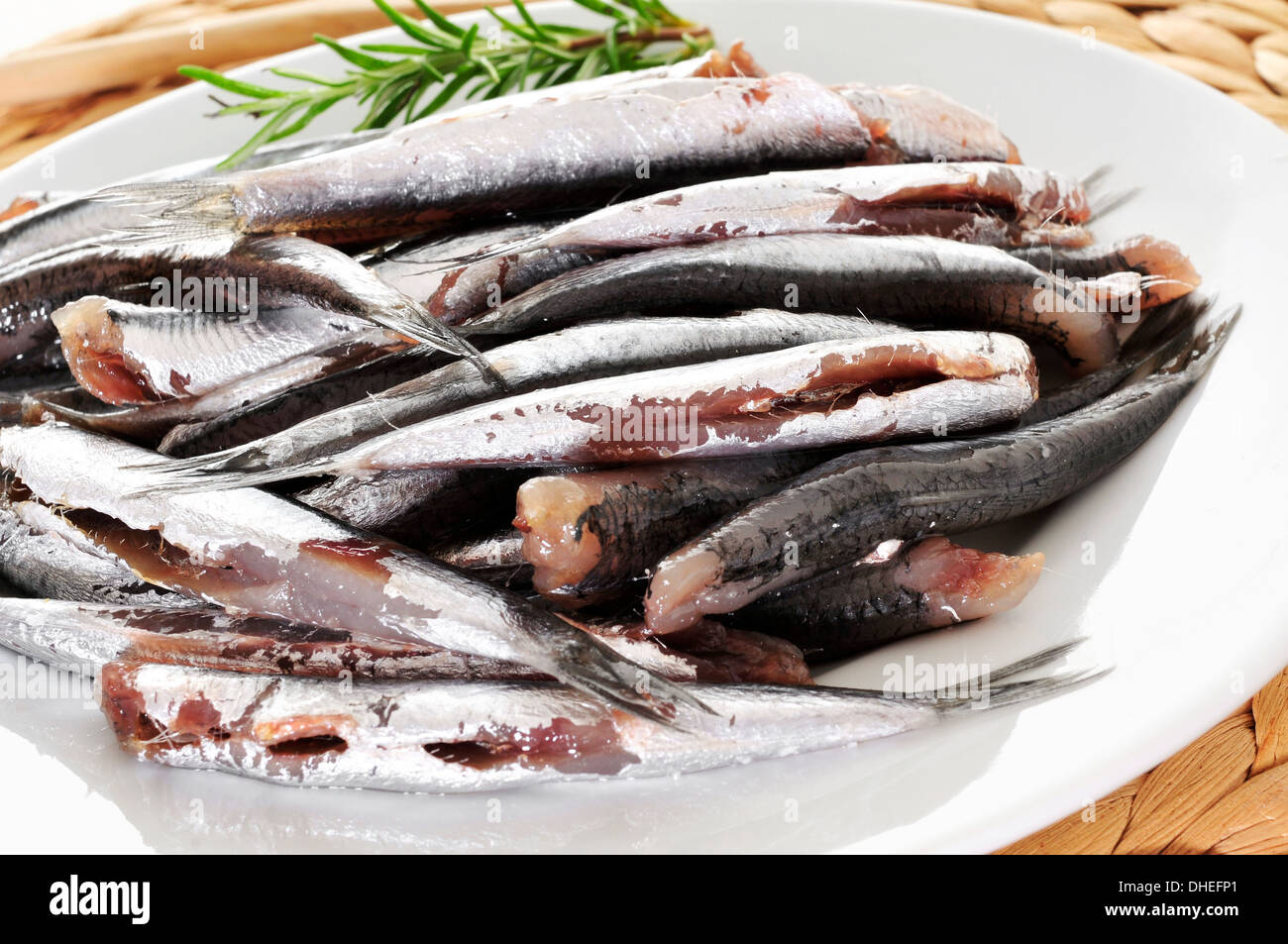 a plate with some raw spanish boquerones, anchovies typical in Spain