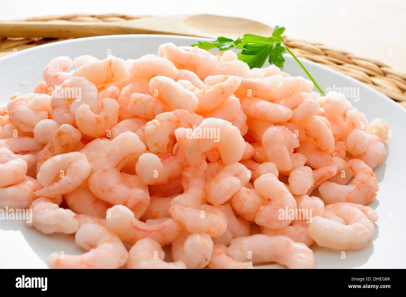 closeup of a plate with shelled raw shrimps Stock Photo
