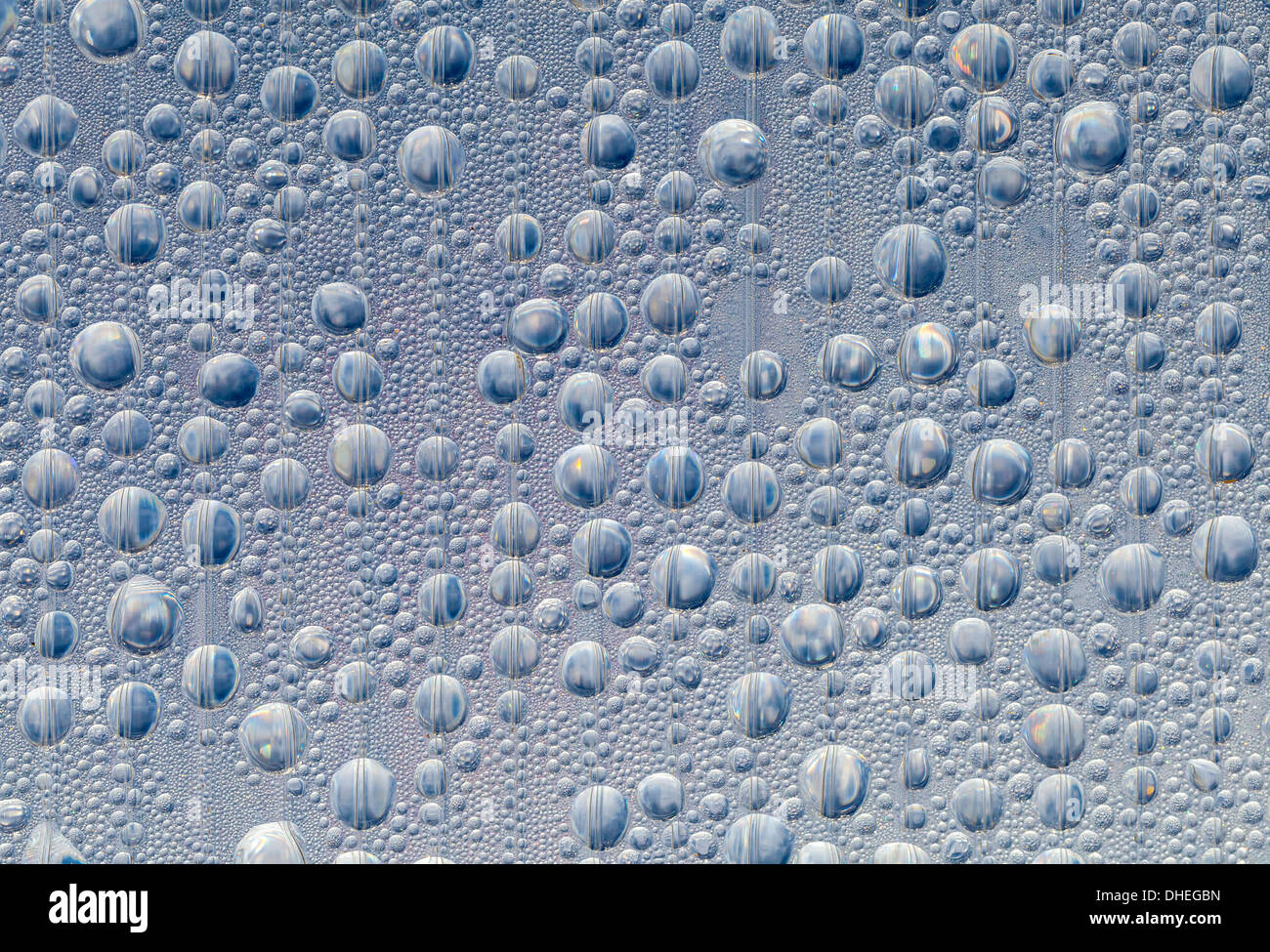 Water drops on transparent plastic surface. Macro photo background texture Stock Photo