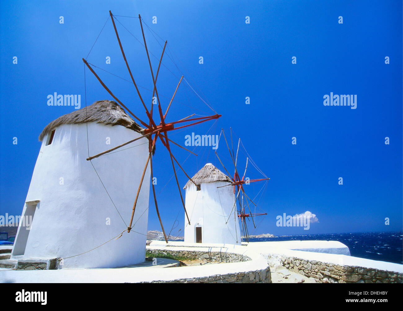 Windmills on the Coast, Mykonos, Greek Islands Stock Photo
