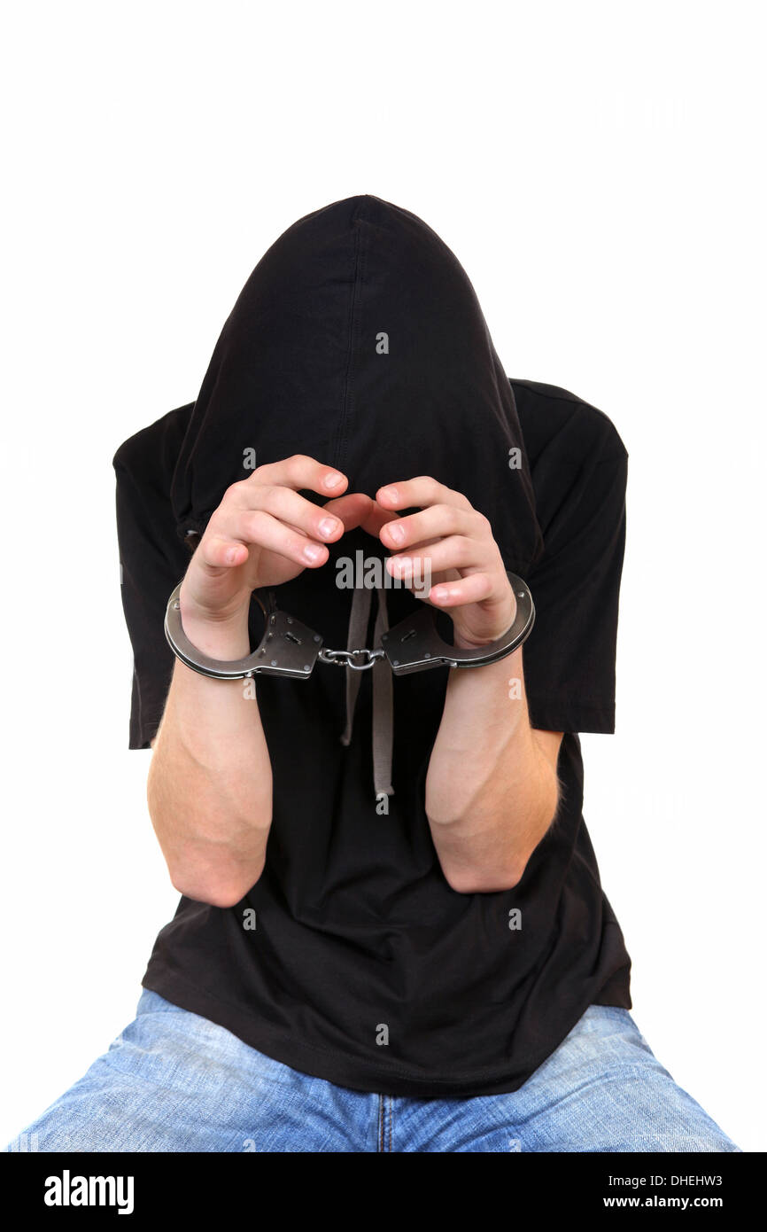 Young Man in Handcuffs Stock Photo