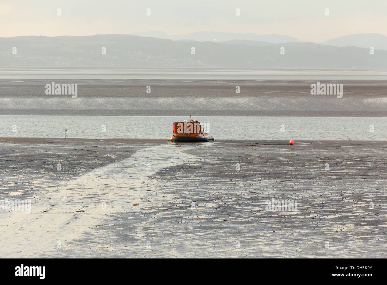 The Royal National Lifeboat Institution (RNLI) hovercraft of Morecambe Bay in an early evening practice session. Stock Photo