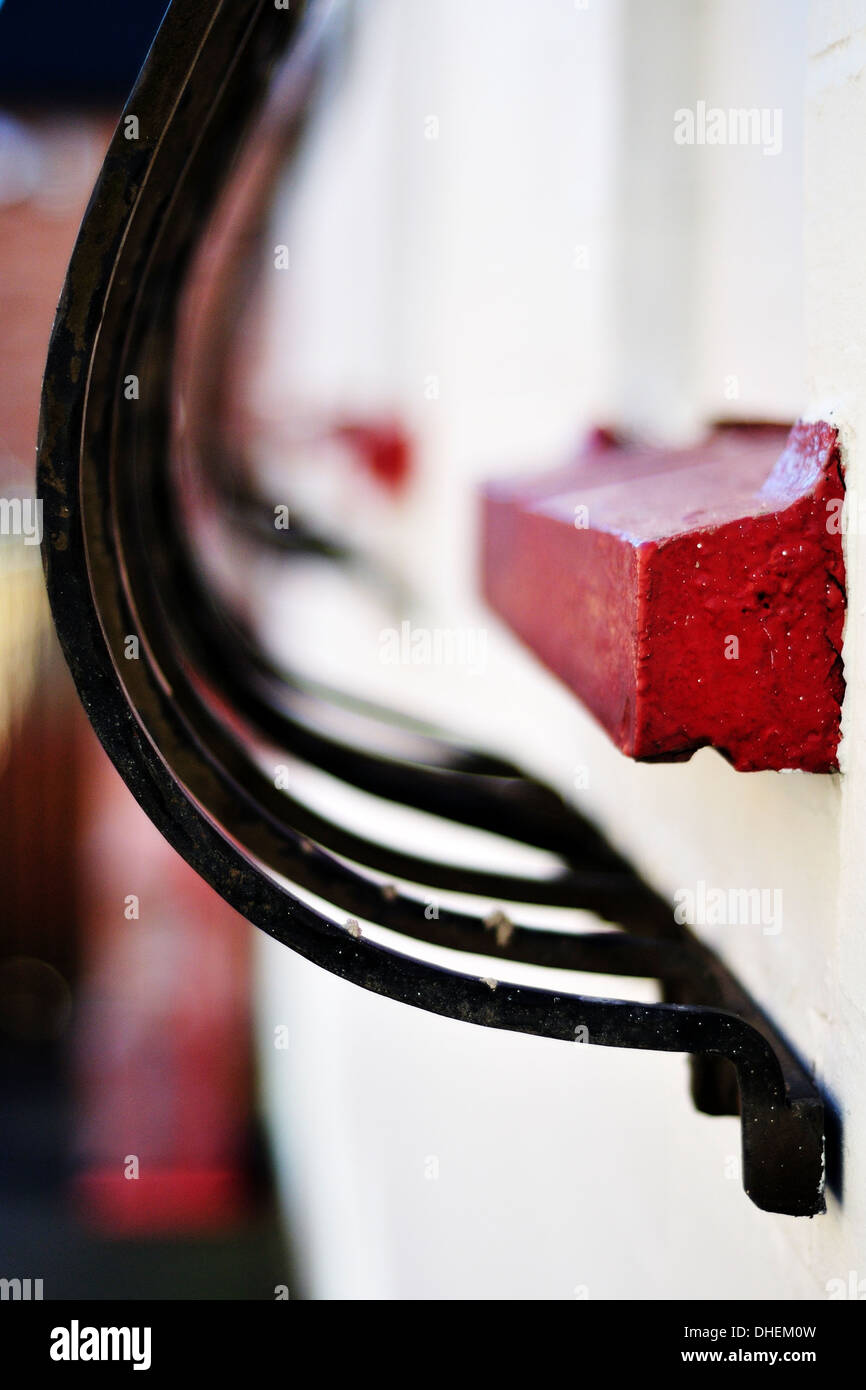 Ornate curved iron railings protecting a buildings windows Stock Photo ...