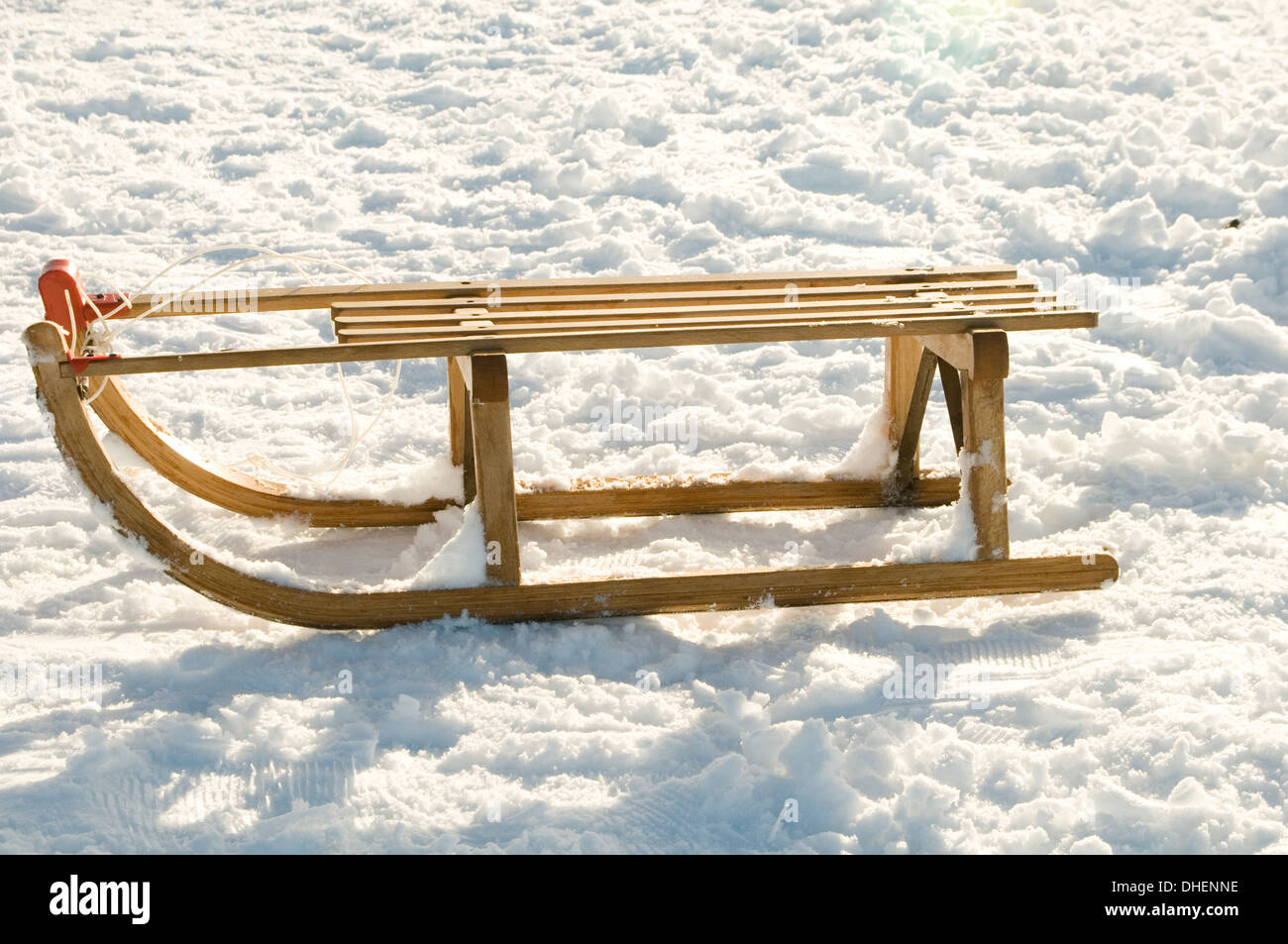 toboggan toboggans sledge sledging snow winter sledges tobogganing wood  wooden traditional Stock Photo - Alamy