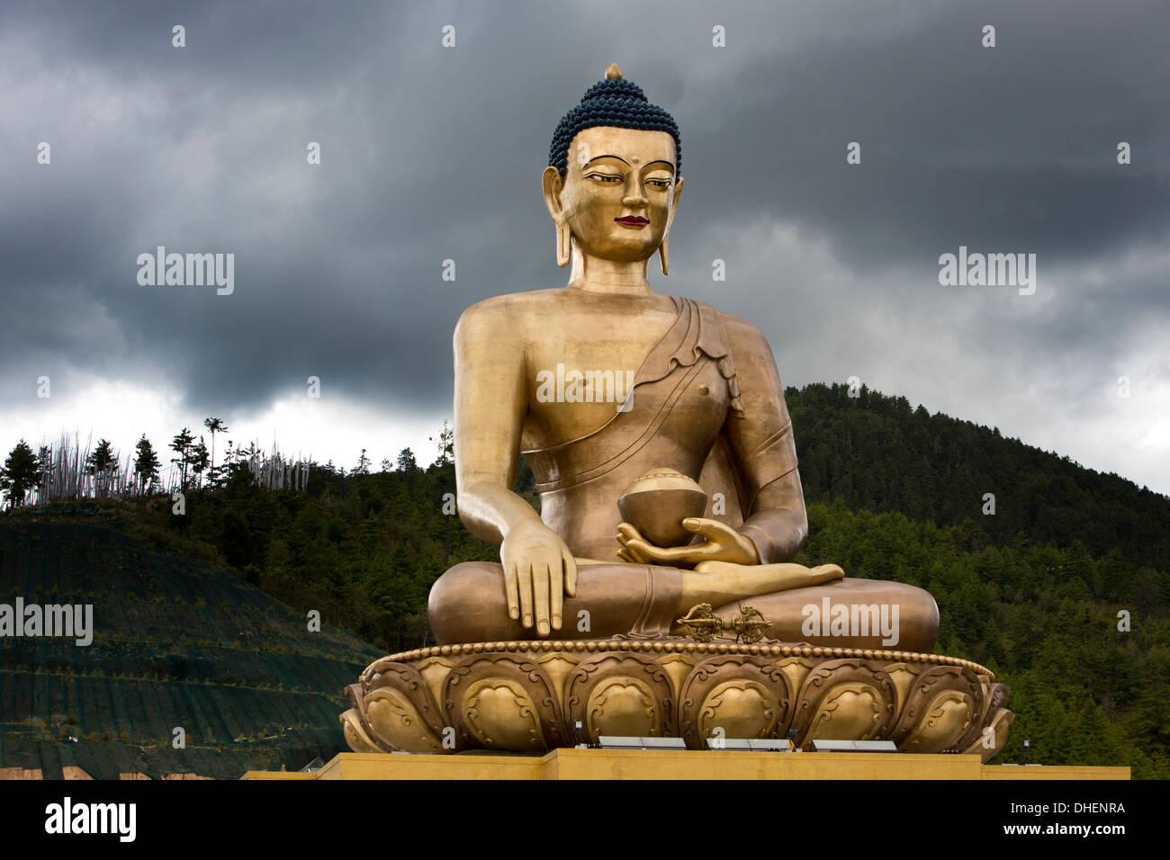 Bhutan, Thimpu, Big Buddha Dordenma Statue, gigantic Sakyamuni Buddhist figure with approaching storm behind Stock Photo