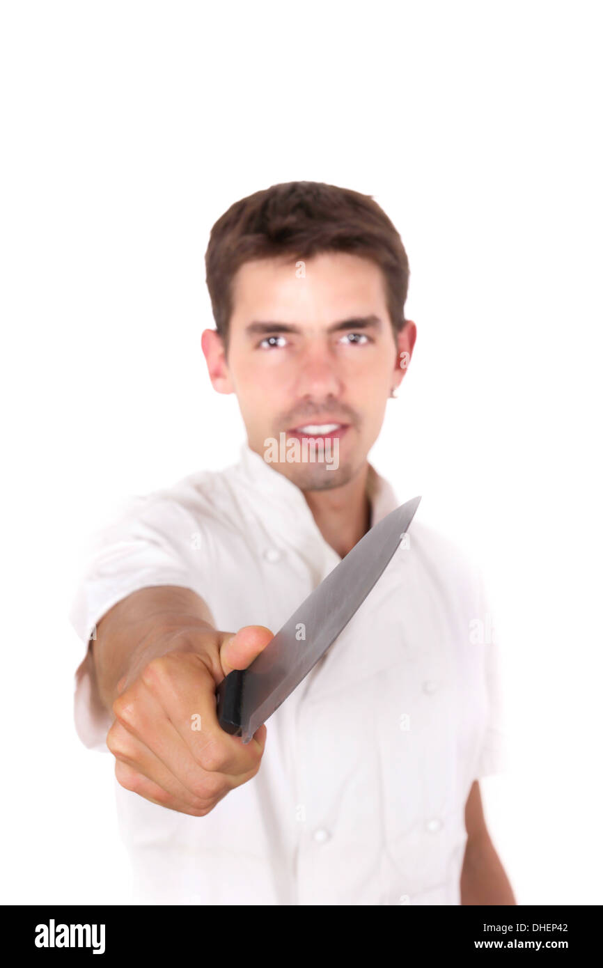 Chef with capable hands pointing with the knife Stock Photo