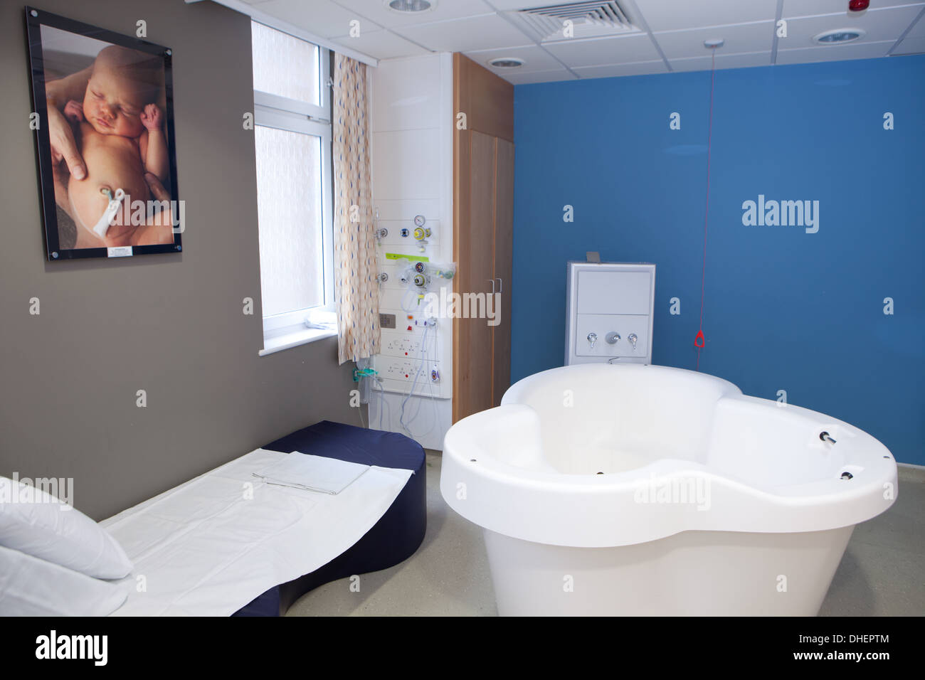 A maternity unit room with a birthing pool UK Stock Photo