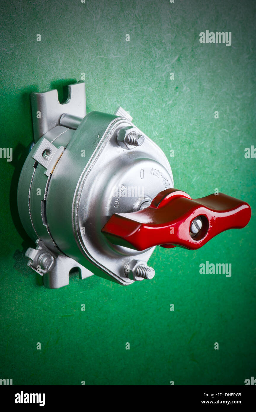 tool on green - chrome retro toggle switch Stock Photo