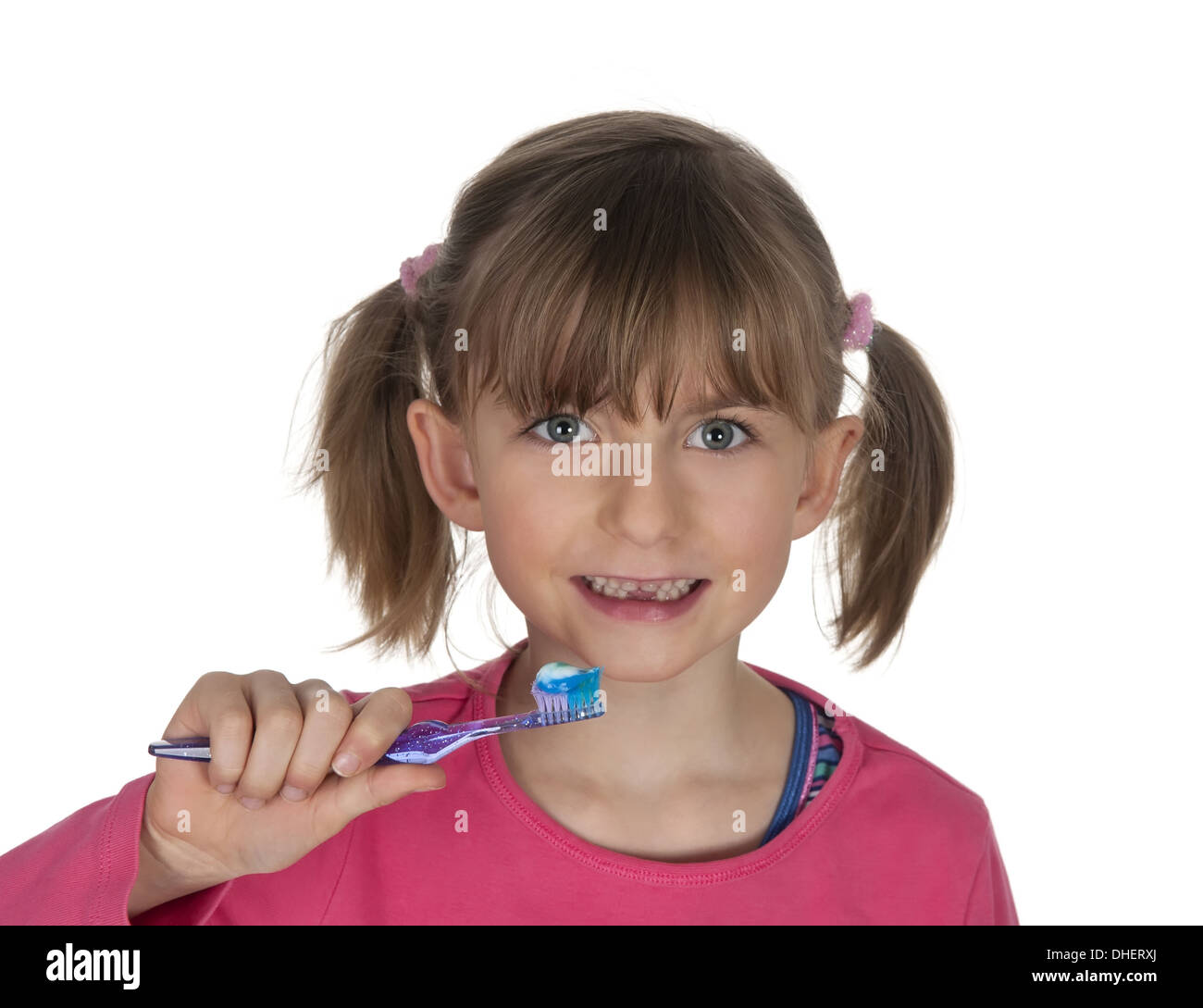 girl brushing teeth Stock Photo