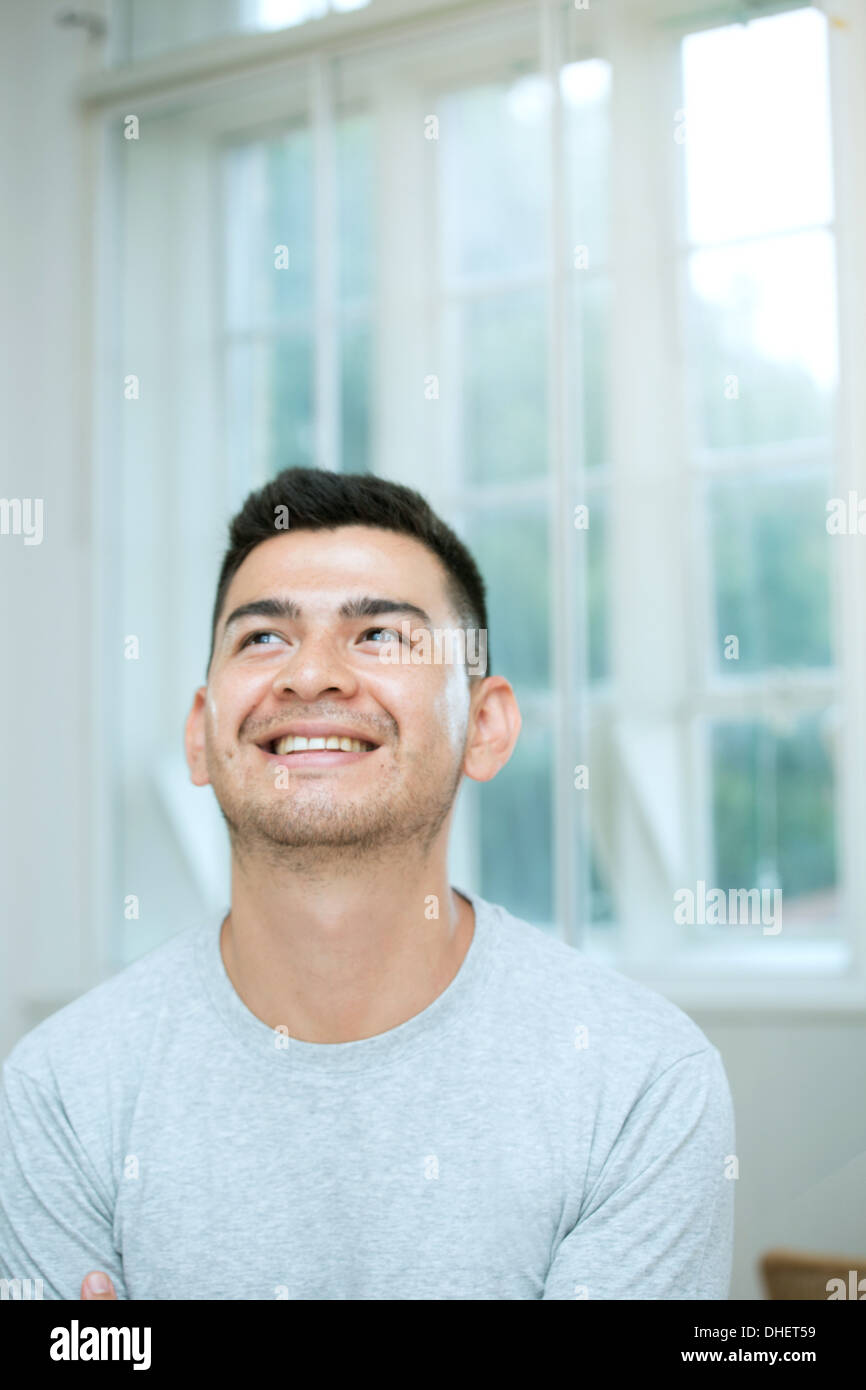 Mid adult man looking up Stock Photo